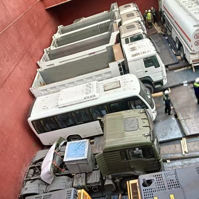 Servicios de transporte de vehículos y maquinaria de construcción